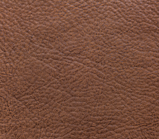 close up image of a of brown leather anniversary card